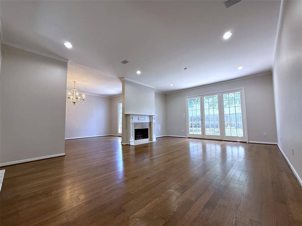 Each the dining room and the living room offer a view into the nicely sized back yard.