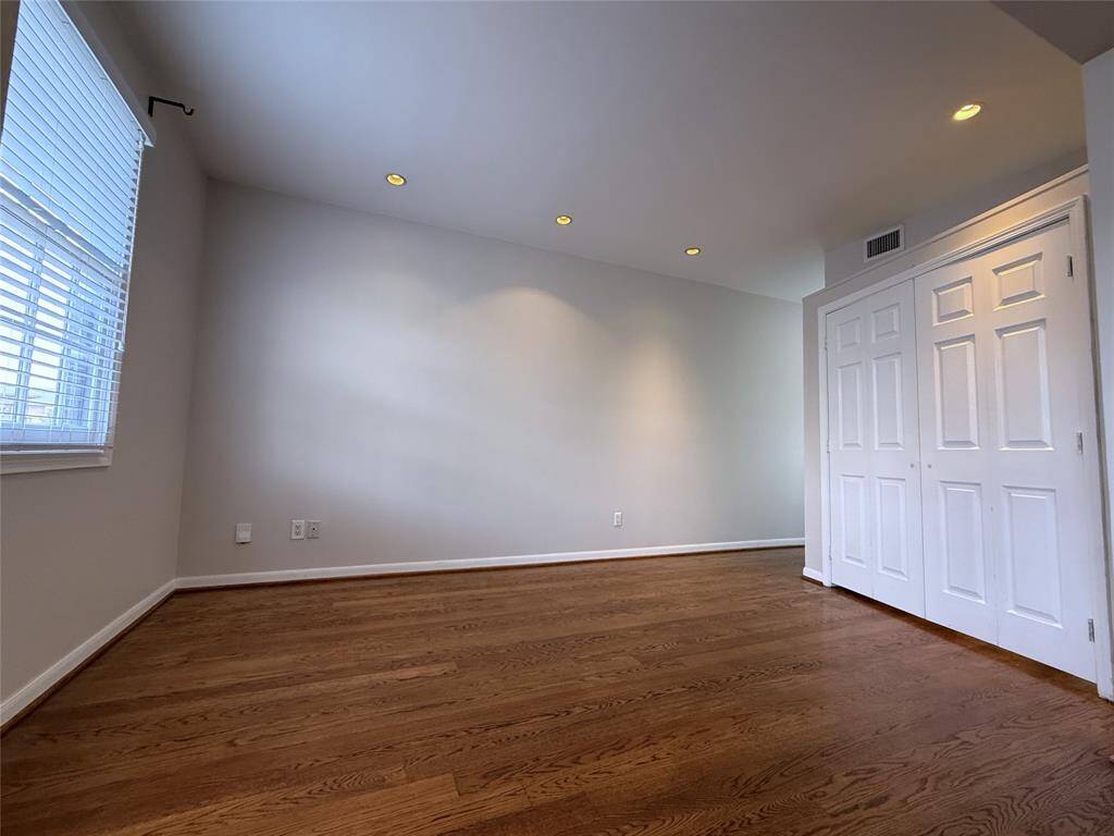 Adjoining the home office is the breakfast room. This space also be utilized as a fitness room.