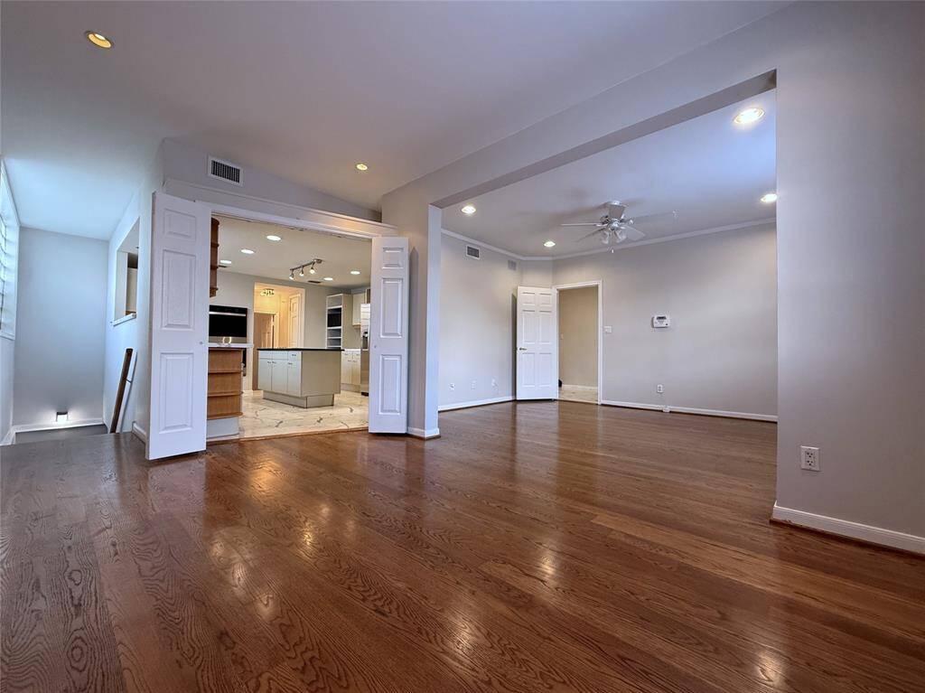 Viewing from the breakfast room, notice the kitchen can be closed off by folding doors for privacy.