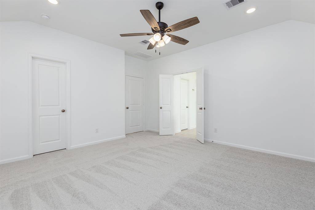 Primary Bedroom with Two Large Walk-in Closets