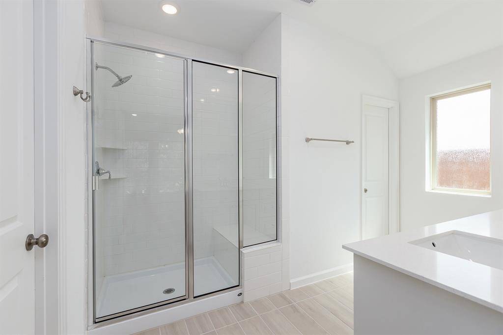 Primary Bath with an extended shower
