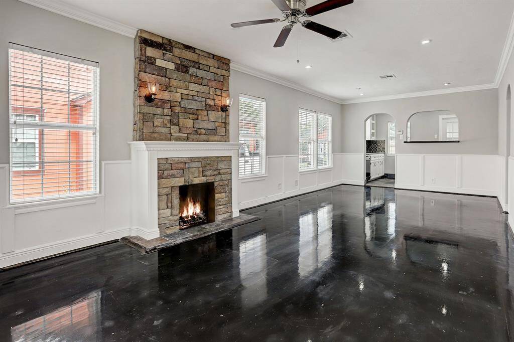 EACH ROOM OF THIS UNIQUE JEWEL BOX IS FILLED WITH AN ABUNDANCE OF NATURAL LIGHT! THE HOME IS FRESHLY PAINTED IN A WARM INVITING TONE & GLEAMING FLOORS