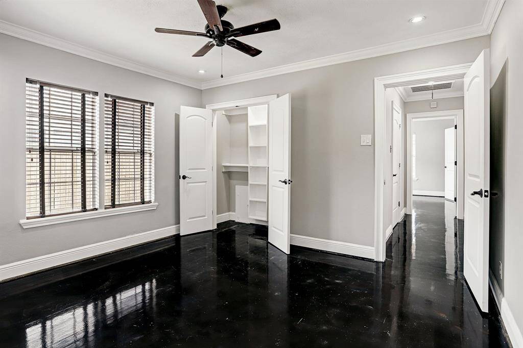 SECONDARY BEDROOM SHOWING THE CLOSET SPACE WITH BUILT-IN SHELVING!