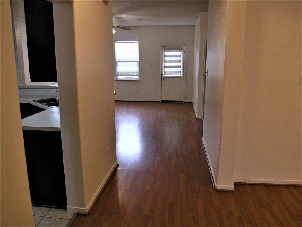 From entrance to Family Room, Kitchen on the Left Dining Room on the right