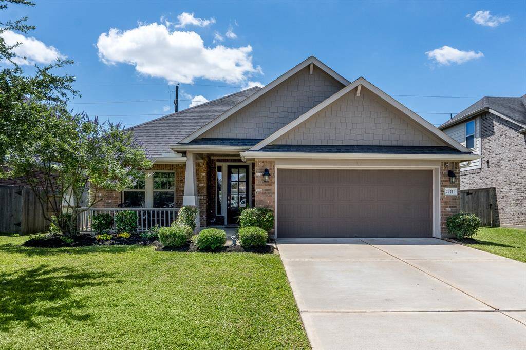 Welcome to 29411 Barker Meadow Lane, a home that commands attention from the moment you arrive. Nestled in the highly sought-after Young Ranch community, this property offers the perfect blend of charm, comfort, and curb appeal.