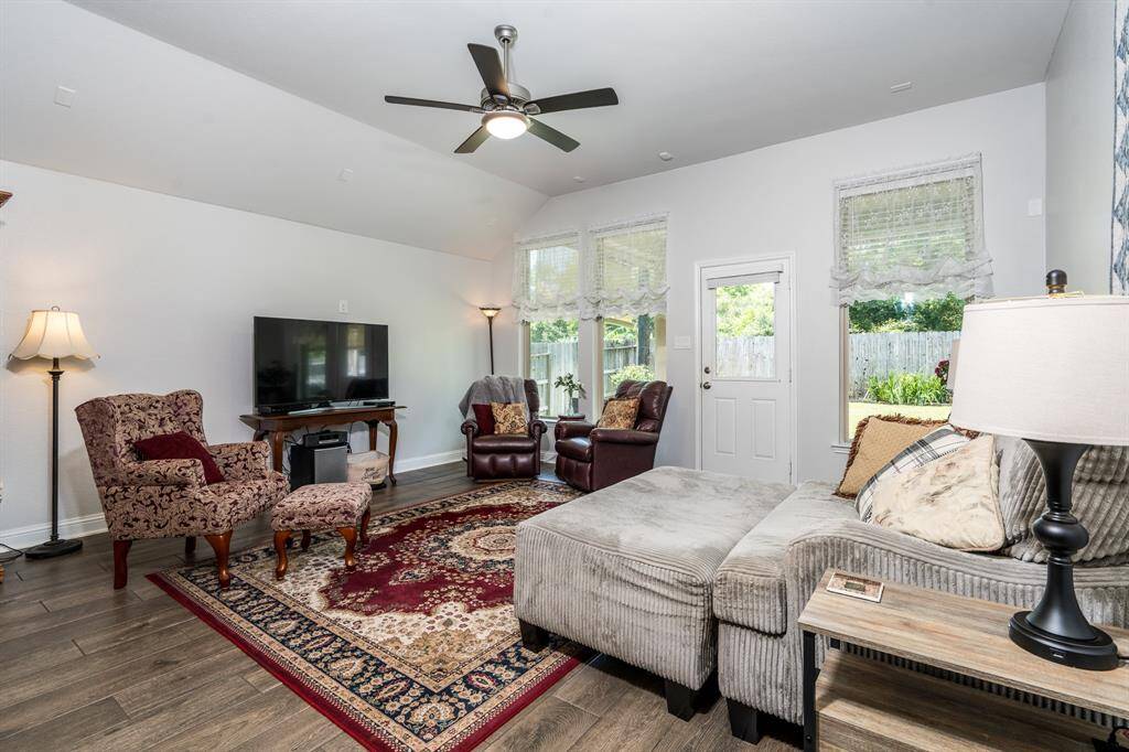 The family room offers plenty of space for comfortable seating and furniture, making it the perfect place for relaxation and entertaining.