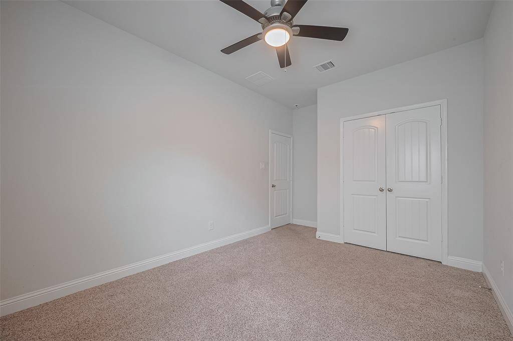 Step outside to the covered patio and private backyard, complete with a relaxing hot tub — all with no back neighbors, offering extra privacy for your outdoor enjoyment.
