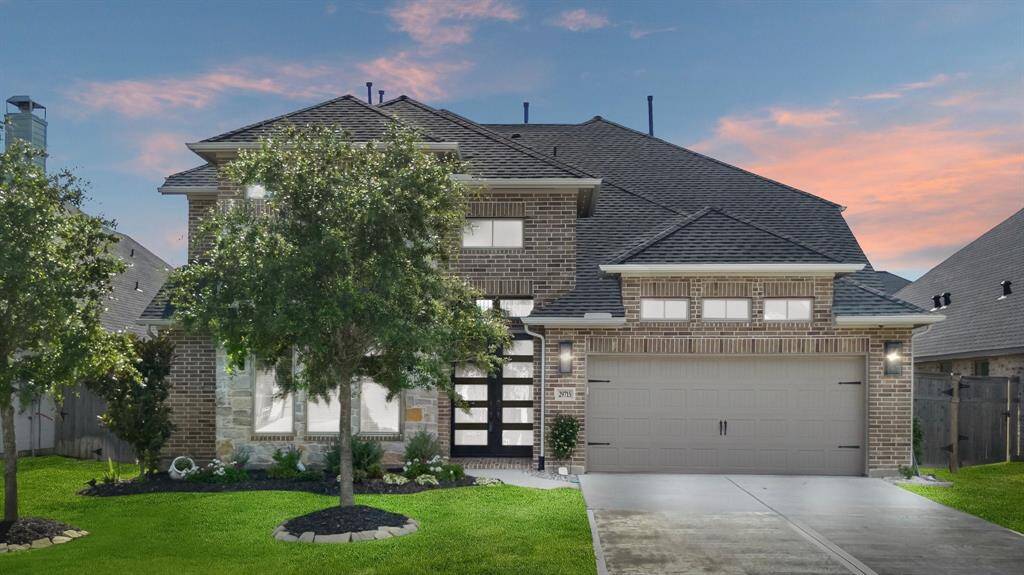 Evening view of this beautiful home.