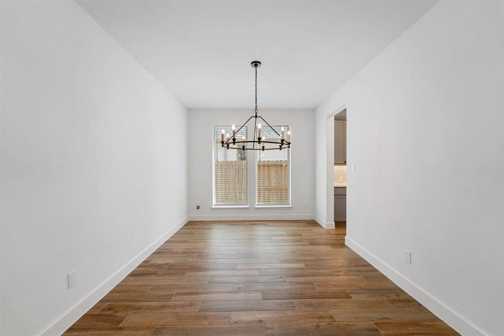 Formal dining space right off the kitchen and open to the living room area. Great flow for entertainment