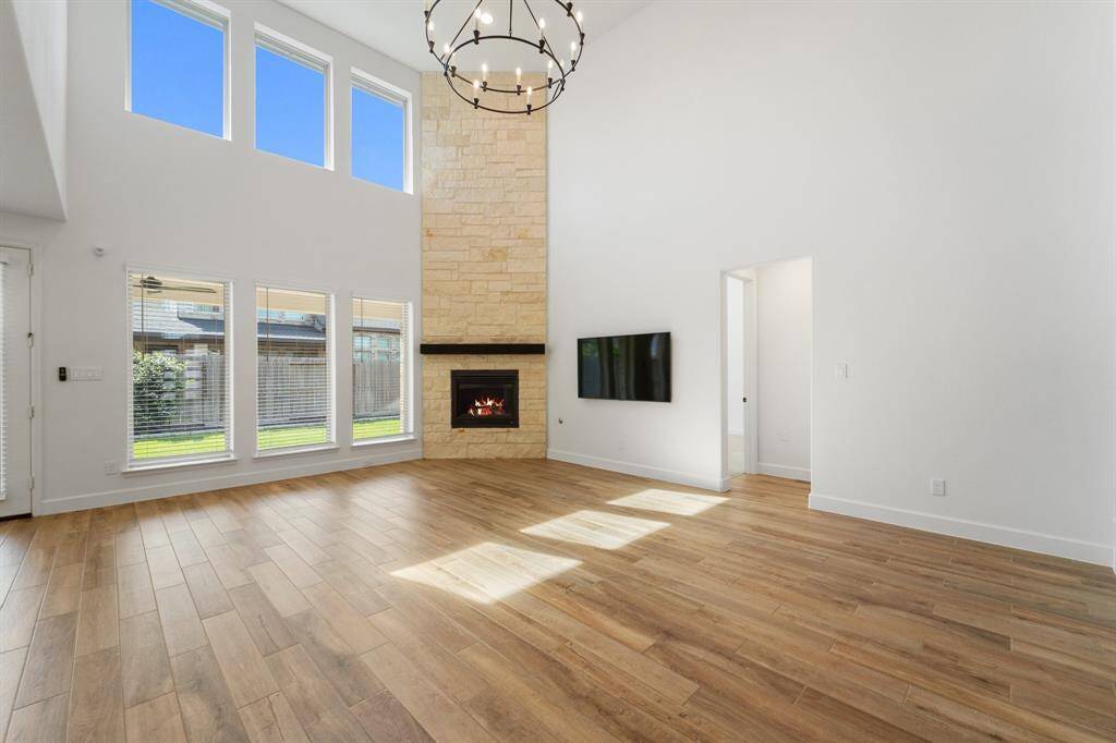 Soaring 2 story ceilings with floor to ceiling windows.