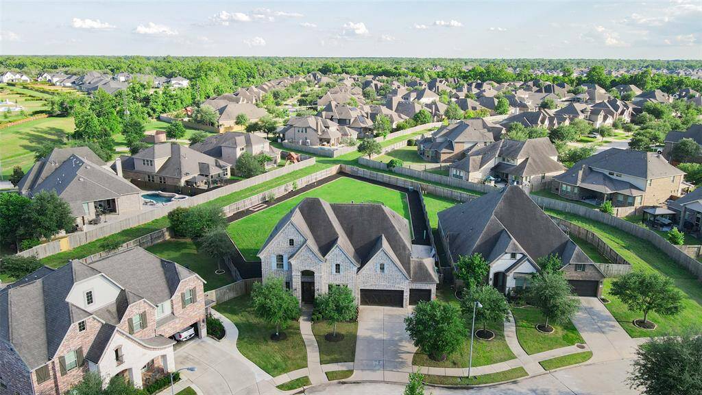Take in the impressive scale of this oversized lot—one of the largest in the entire neighborhood—offering unmatched space and privacy.