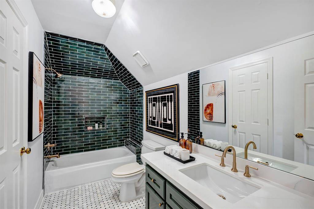 Secondary bathroom adjoins second bathroom and was updated in 2024.