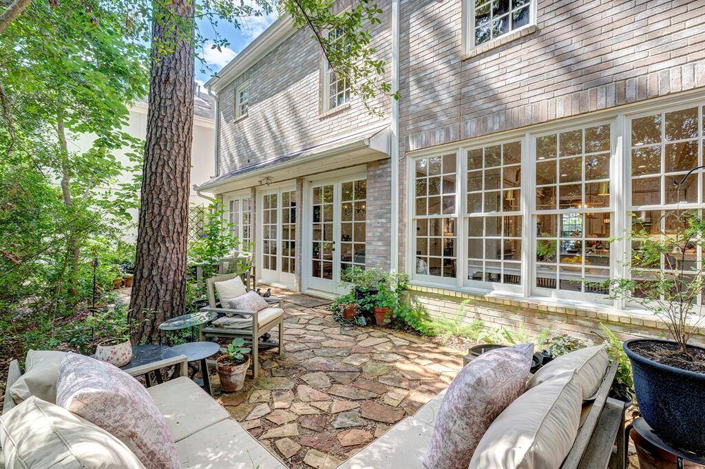 Third bedroom with treetop views and large walk-in closet.  9ft ceilings on second floor.