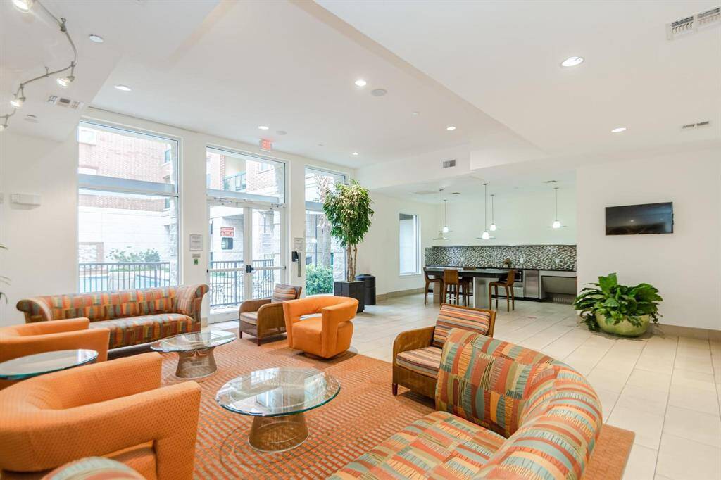 Oversize community club house next to swimming pool & summer kitchen