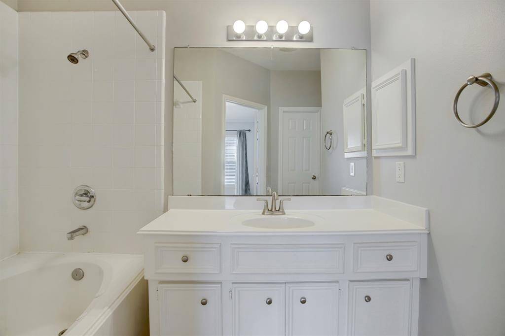 Master bathroom with plenty of storage.