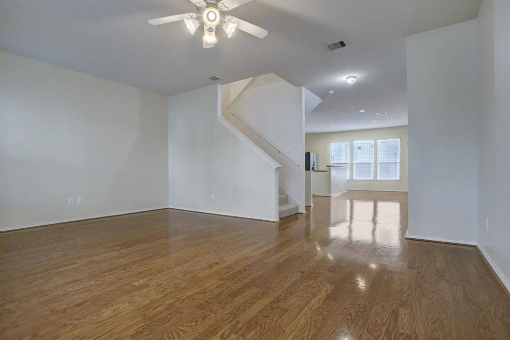 On the second floor, the family room flows into the kitchen & dining.