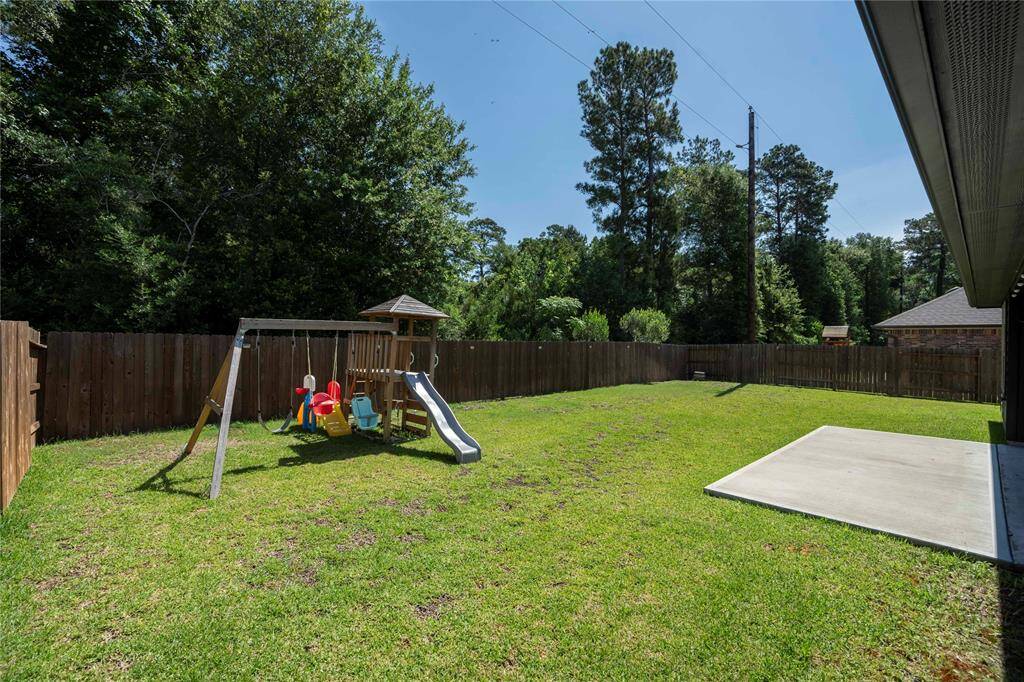 Backyard from side corner-playset