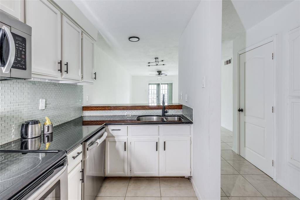 Pull some bar stools up to the breakfast bar for casual dining.