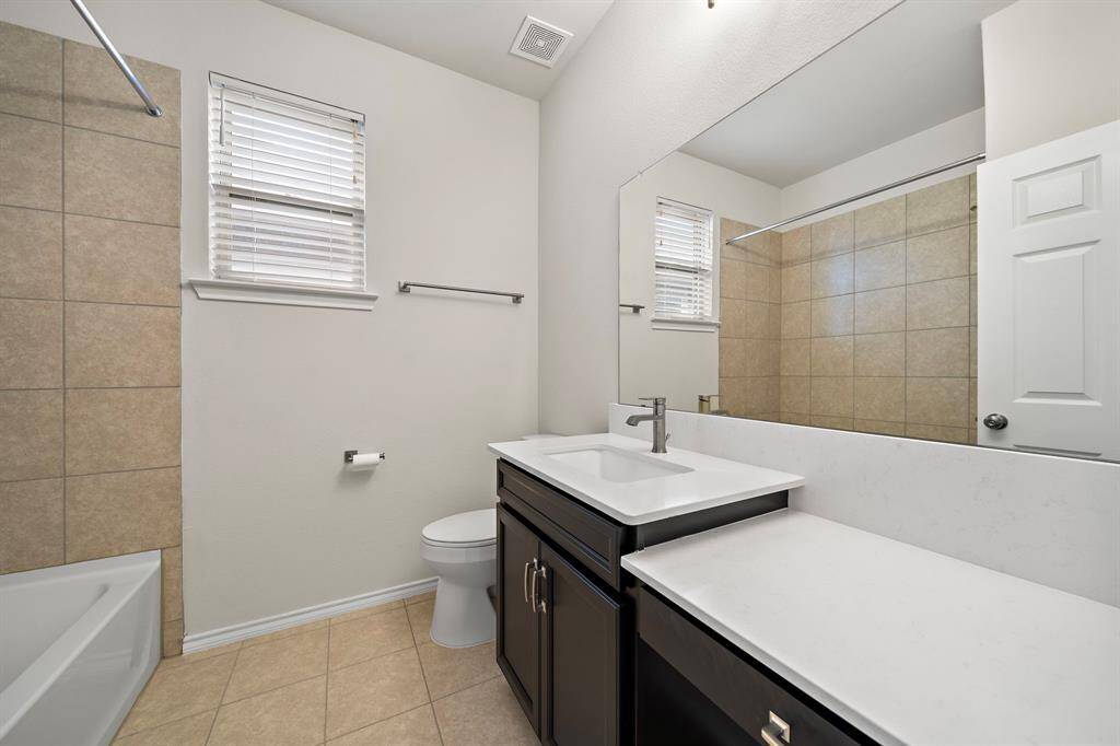 Guest bath with vanity and tub/shower