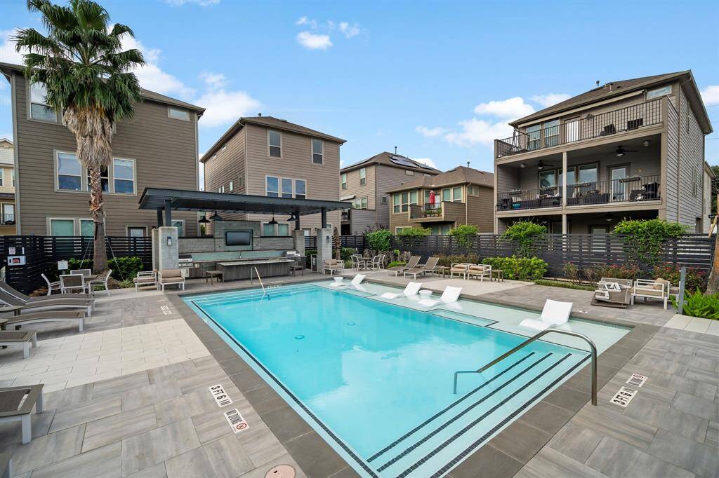 Resort pool and outdoor kitchen and entertaining space
