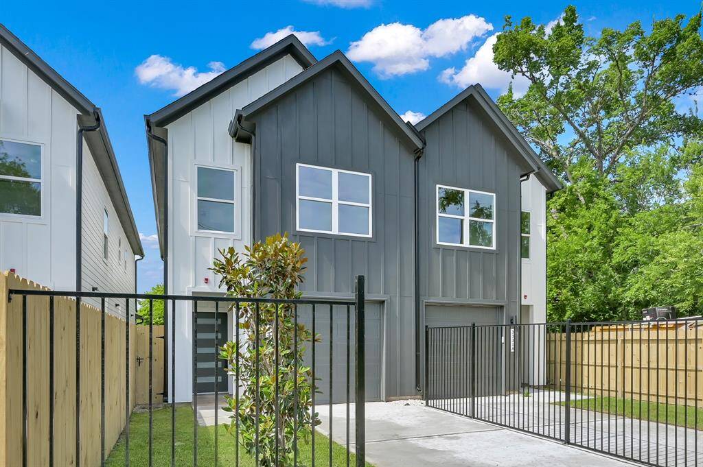 Iron fencing and separate driveways