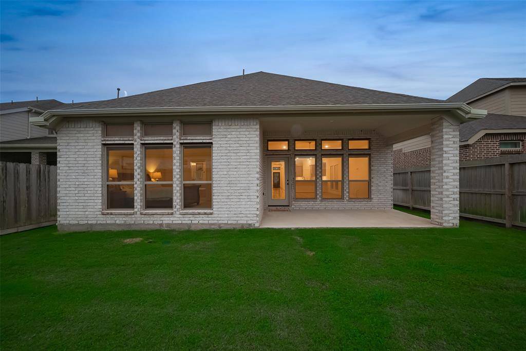 The spacious backyard offers blank canvas with plenty of room for recreation and gardening!