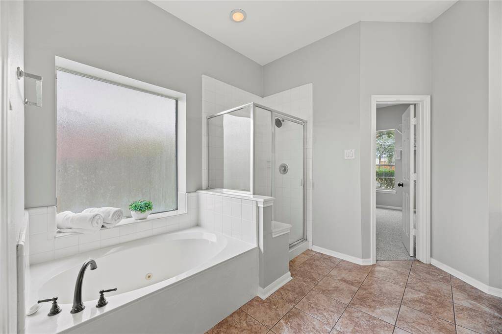 Come home to a glass of wine and a hot aromatherapy bubble bath in your enormous soaking tub.