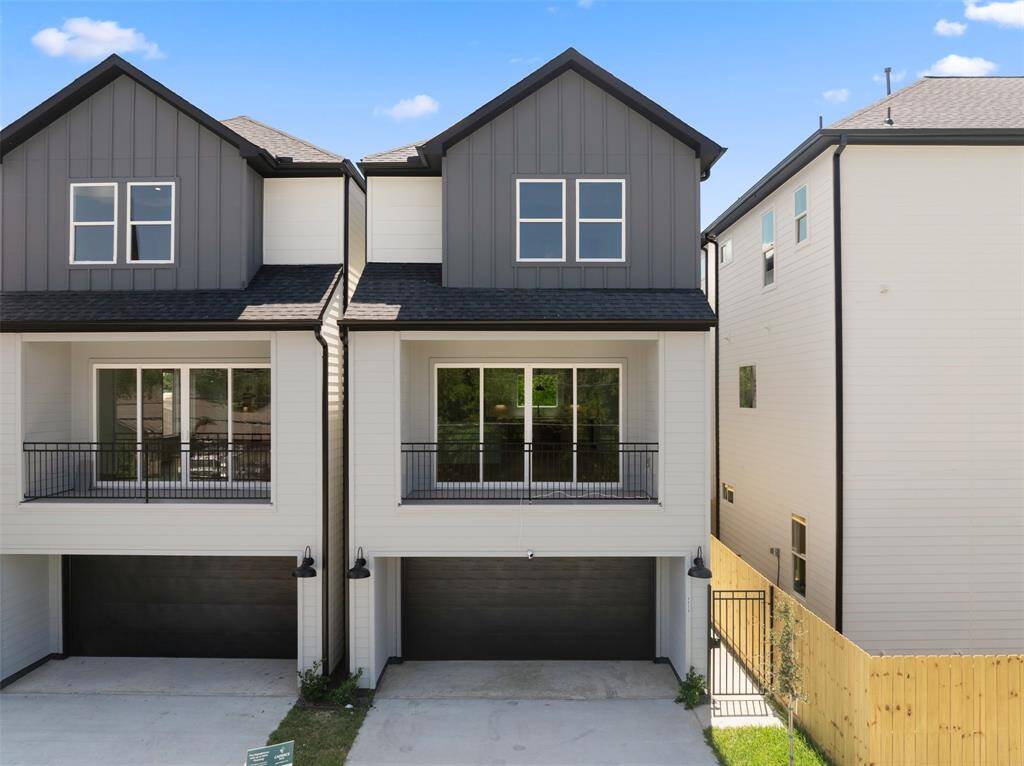 This home has an attached garage and outdoor balcony!