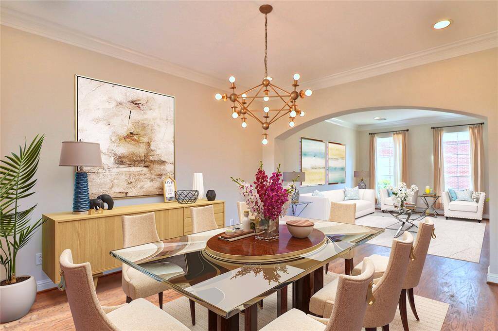 Discover this stunning 4-bedroom, 3.5-bath home in a prestigious gated community. Features virtual staging in the dining and living rooms.