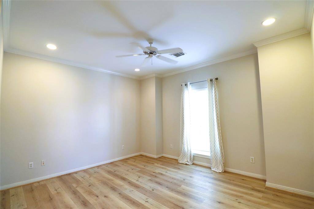 Spacious and versatile game room  perfect for entertainment or relaxation.