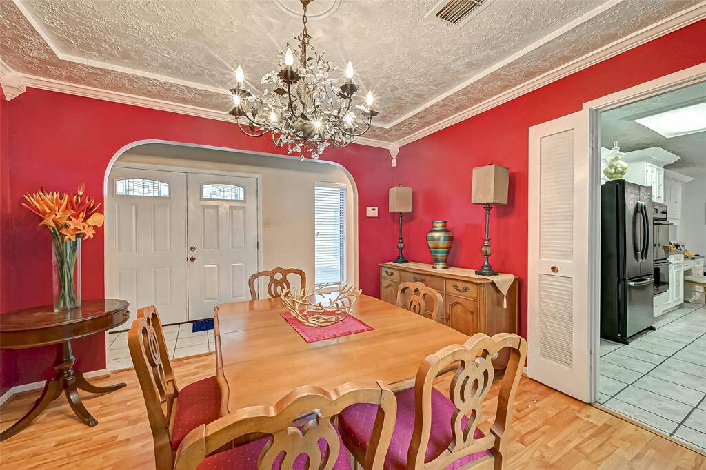 Formal dining room can accommodate several pieces of furniture.