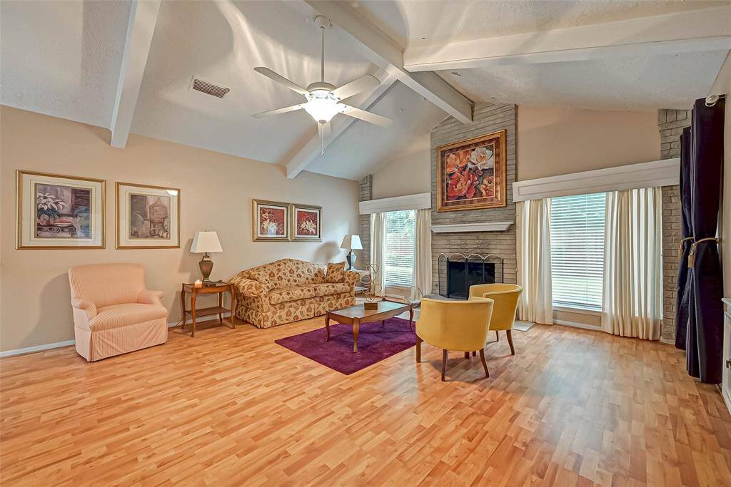Oversize family room with vaulted ceiling.