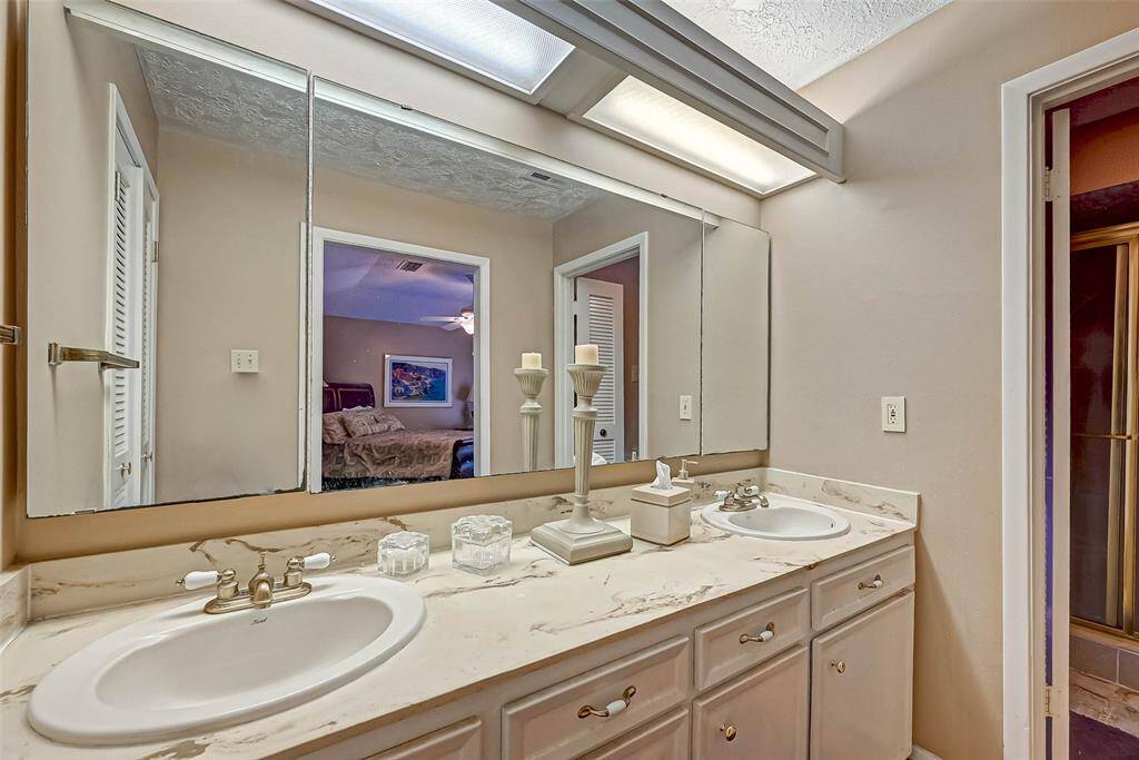 Double sinks in master bedroom, oversize shower and large walk in closet.