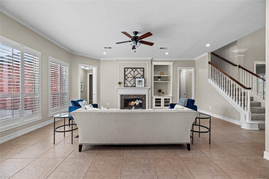 Several windows in the family room display an amazing view of the spectacular oasis backyard!