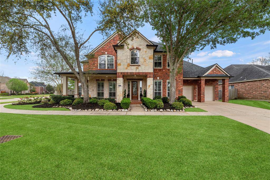 Resting on a gorgeous corner lot, this 4BR/3.5BA property is picturesque with traditional brick detailing, 3-car tandem garage, and tidy landscaping. Combining formal touches with a welcoming vibe, the home invites guests with comfort and beauty.