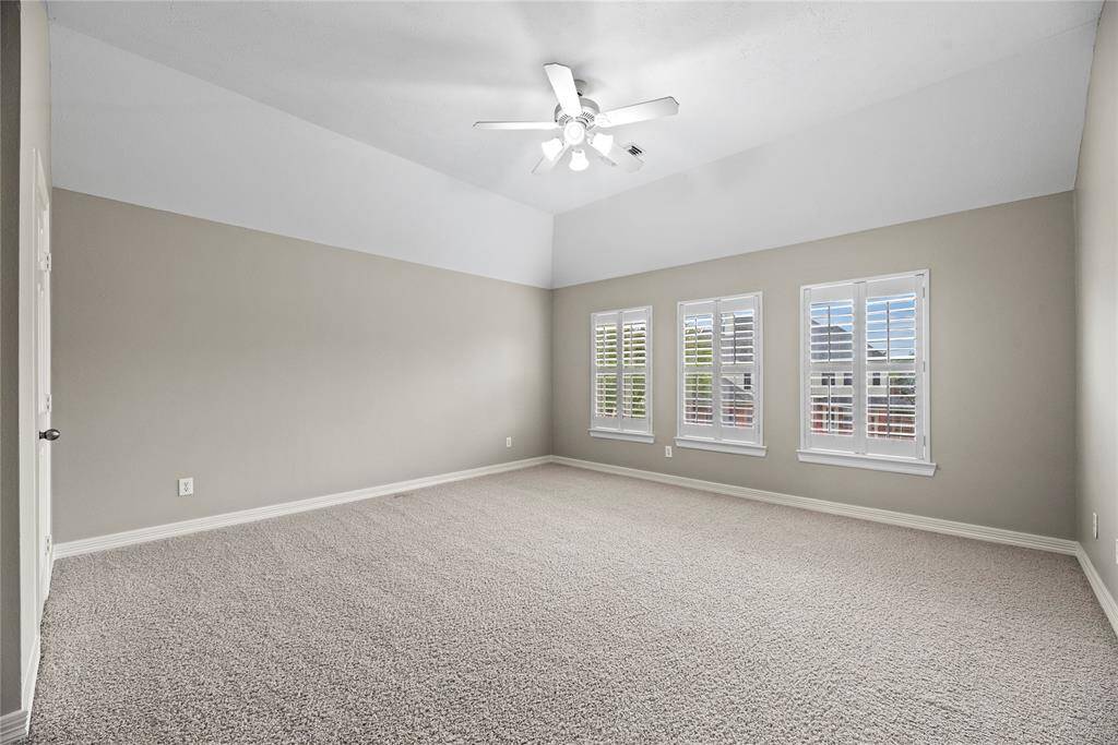 Wooden plantation shutters throughout the home provide traditional style and a truly custom look to every room.