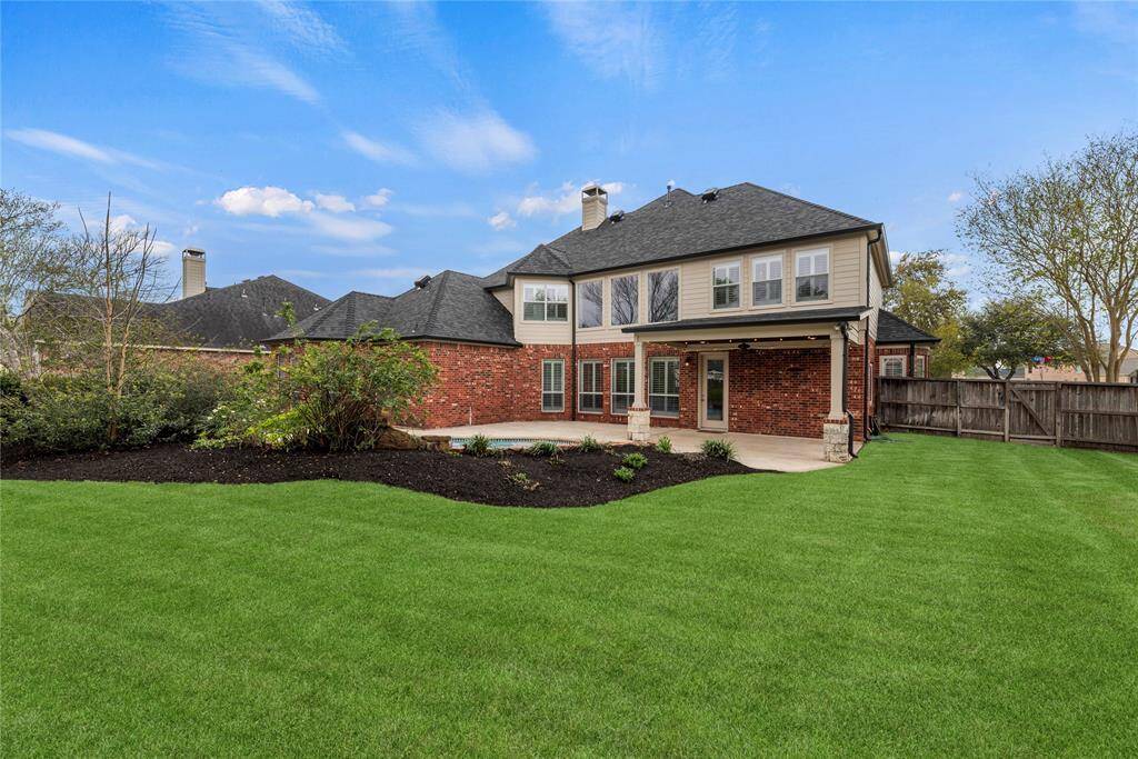 Level and flat, the outdoor space is perfect for playing a game of tag or kickball. For extra fun, set up a playground area for the kids or install raised garden beds for fresh veggies and fruits.