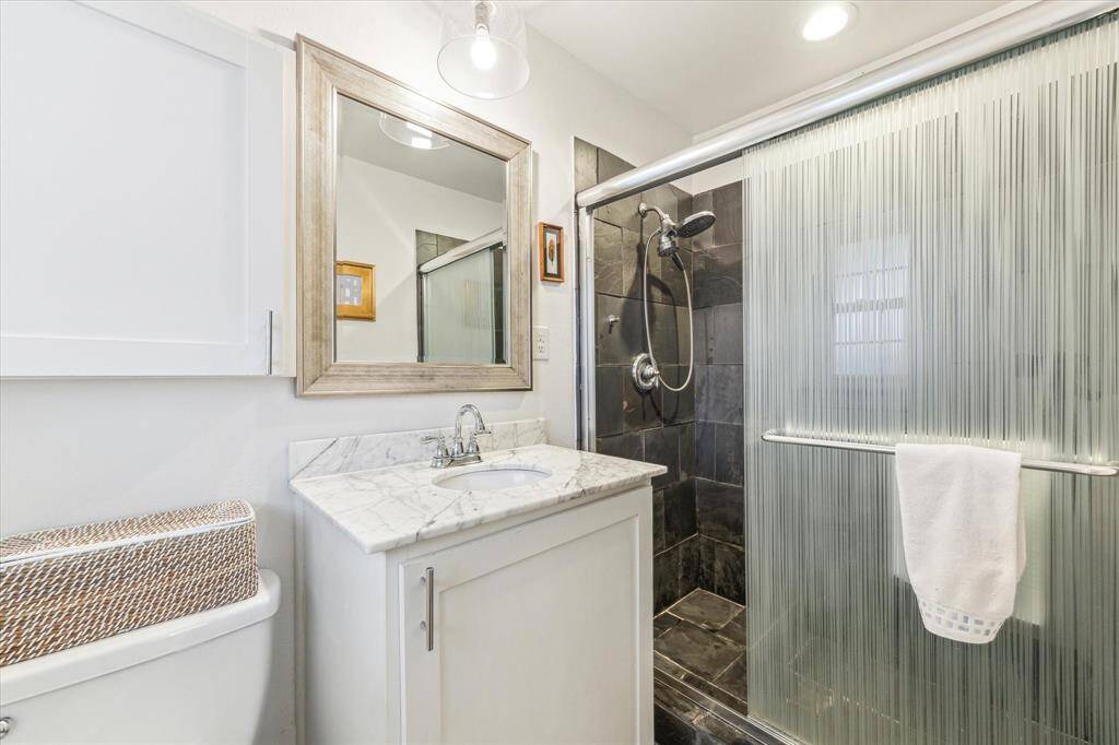 Primary bath with walk-in shower.