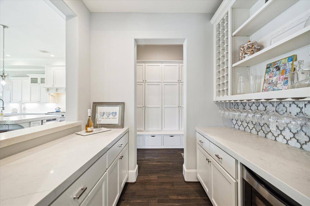 Another view of the Butler's Pantry/Bar. A large mudroom is nearby.