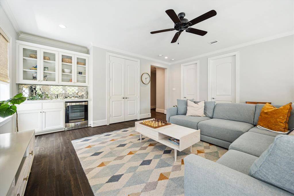 Another view of the Gameroom with a drybar and beverage chiller. There is also a large closet in this room.