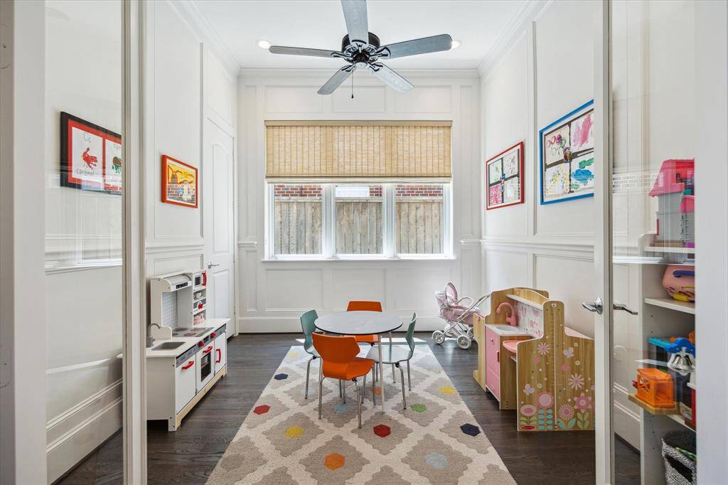 This floorplan offers versatile living spaces including this Study/playroom (12' x 19') located on the first level. The current owners are using as a playroom but it makes a beautiful study with French glass doors, walk-in storage closet and paneled walls.