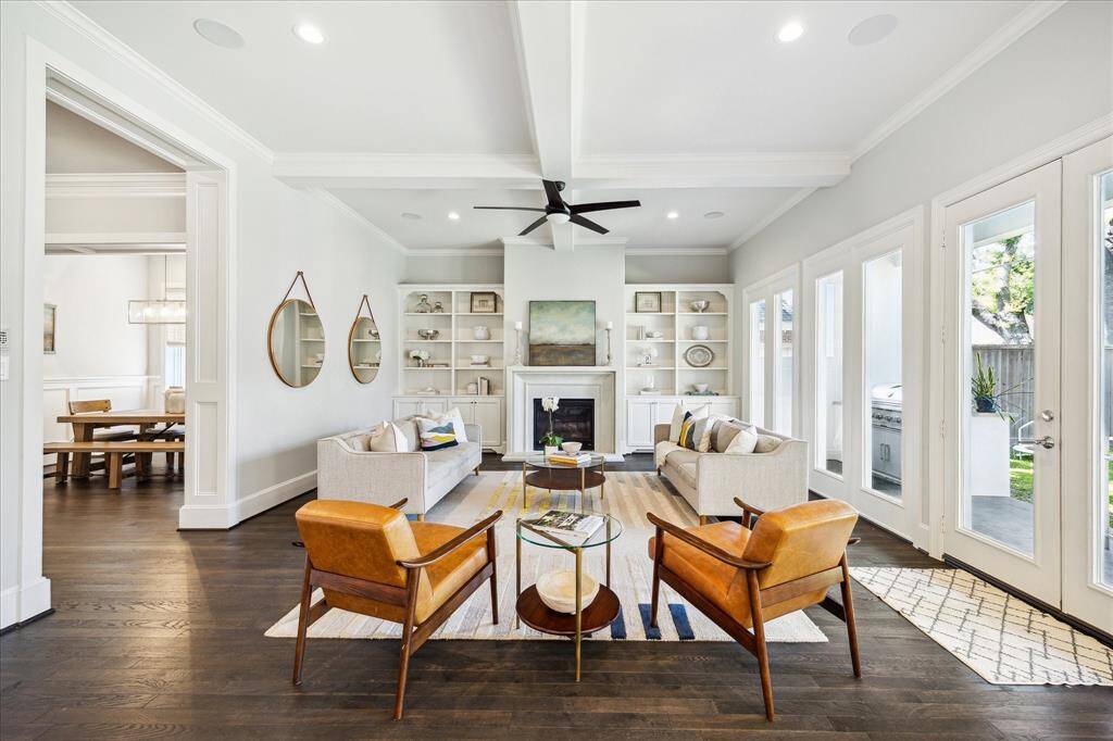 One of the best rooms in this home is the Family Room (20' x 18'). This space offers French door views of the backyard, gorgeous fireplace and built-ins, wood floors and high ceilings. This space flows seamlessly into the chef's kitchen.