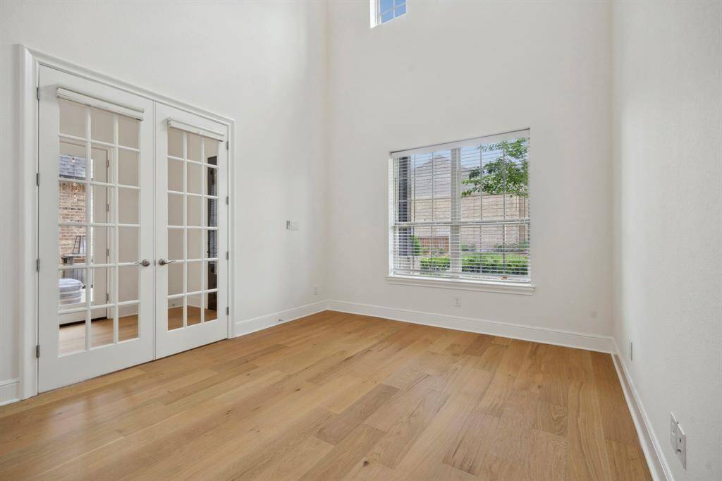 Two story home office located off of the foyer.
