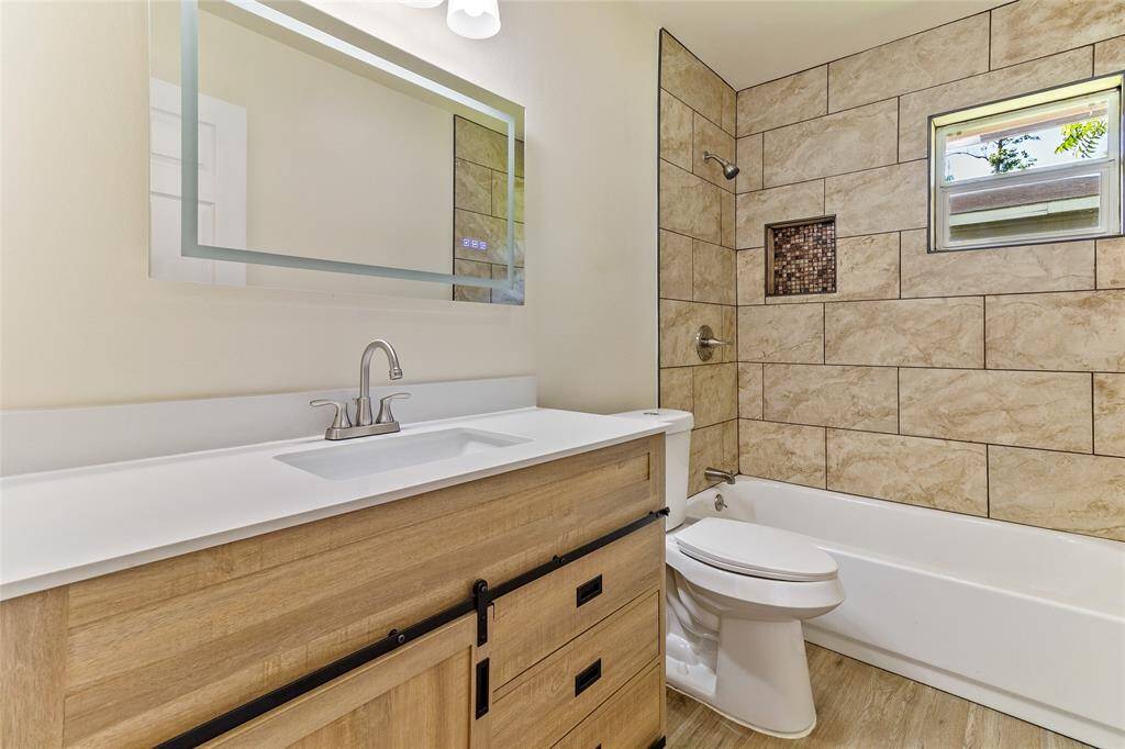 Fully updated second bathroom with heated and lighted mirror