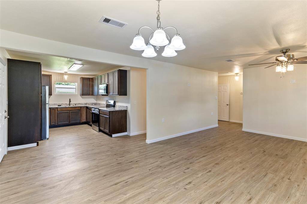 Spacious open floor plan. New lighting, flooring, electrical, plumbing, fixtures and paint throughout the home.