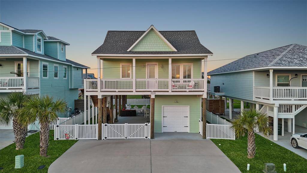 Welcome to 4035 Obra! This stunning custom home makes an unforgettable first impression with its elevated design and soft coastal hues.