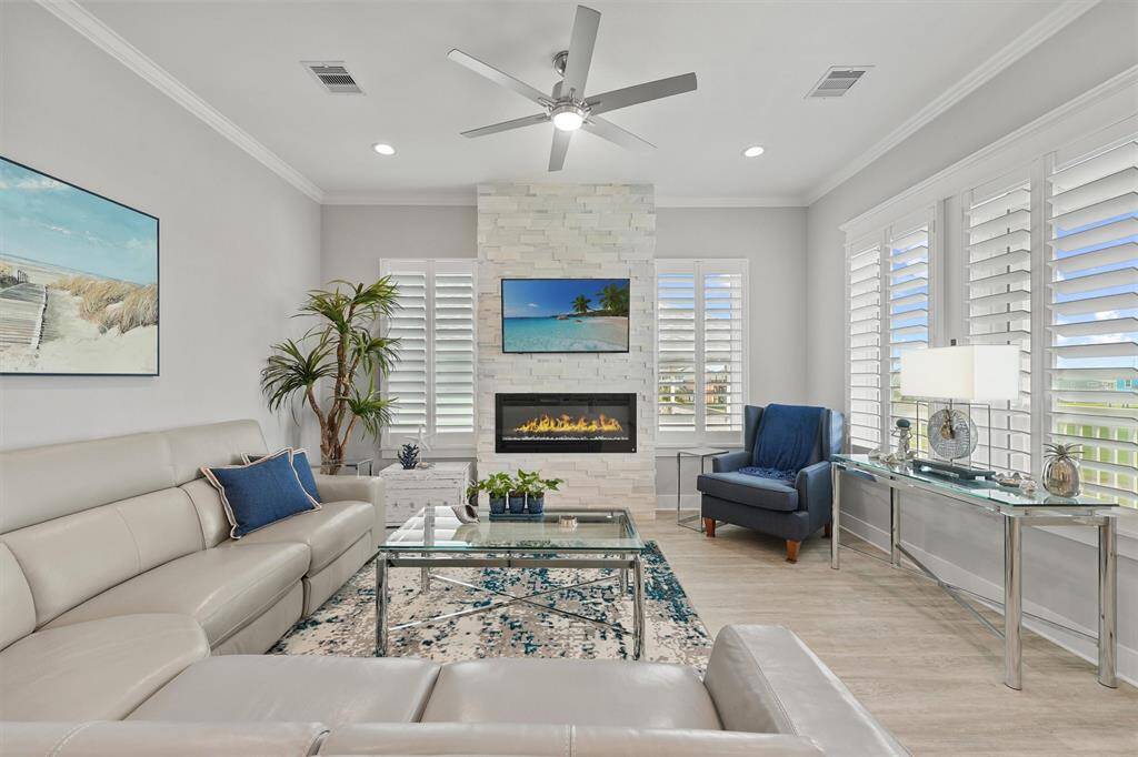 Thoughtfully arranged for entertaining and relaxation, the space blends comfort with sophistication.