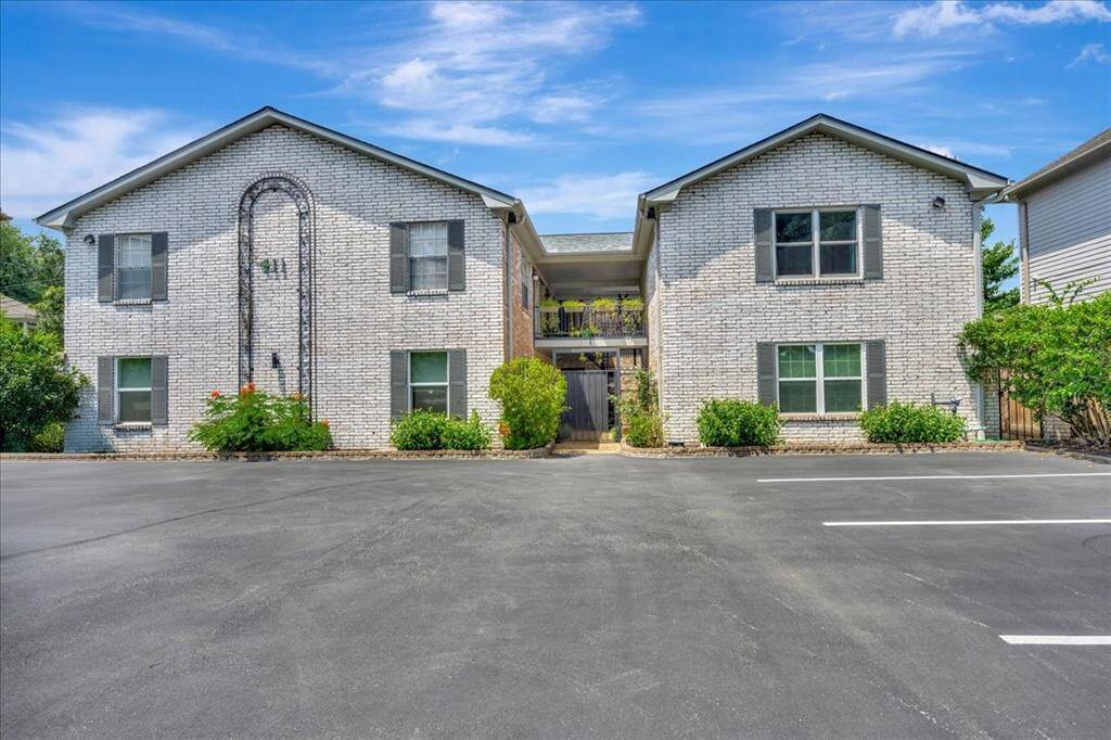 Plenty of parking for this quaint & cozy complex nestled on a quiet tree lined residential street