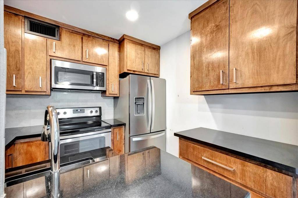 Thoughtfully designed kitchen with generous storage and ample prep areas—perfect for everyday use and entertaining