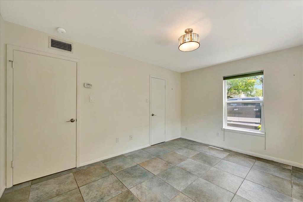 Enjoy the beauty and convenience of tile flooring in the bedroom—stylish and simple to clean.